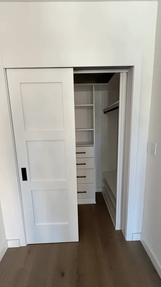 a close up view of walk in closet