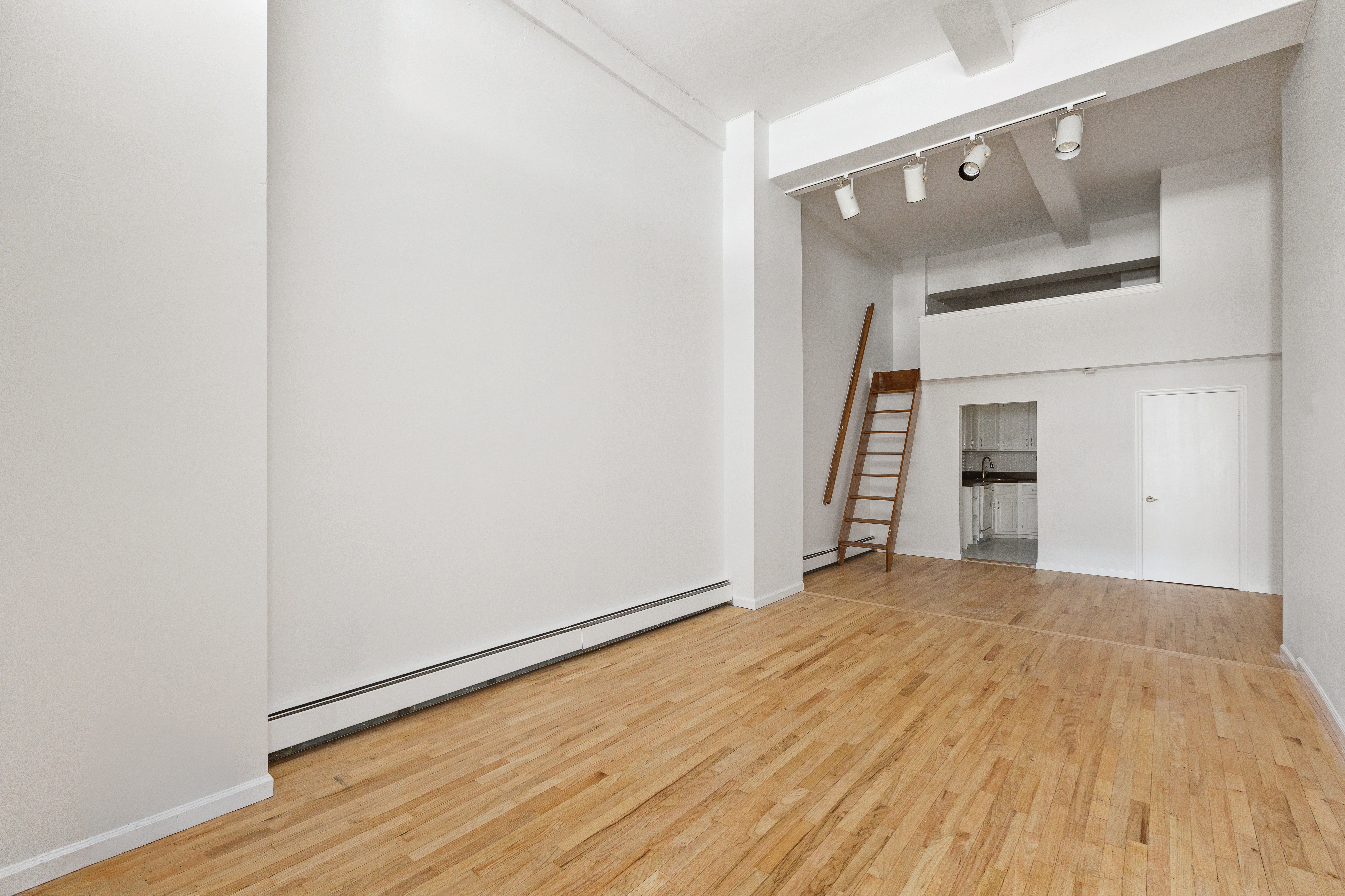 257 West 93rd Street, Unit 3C Manhattan, NY 10025 - Photo 10 of 20 a view of empty room with wooden floor