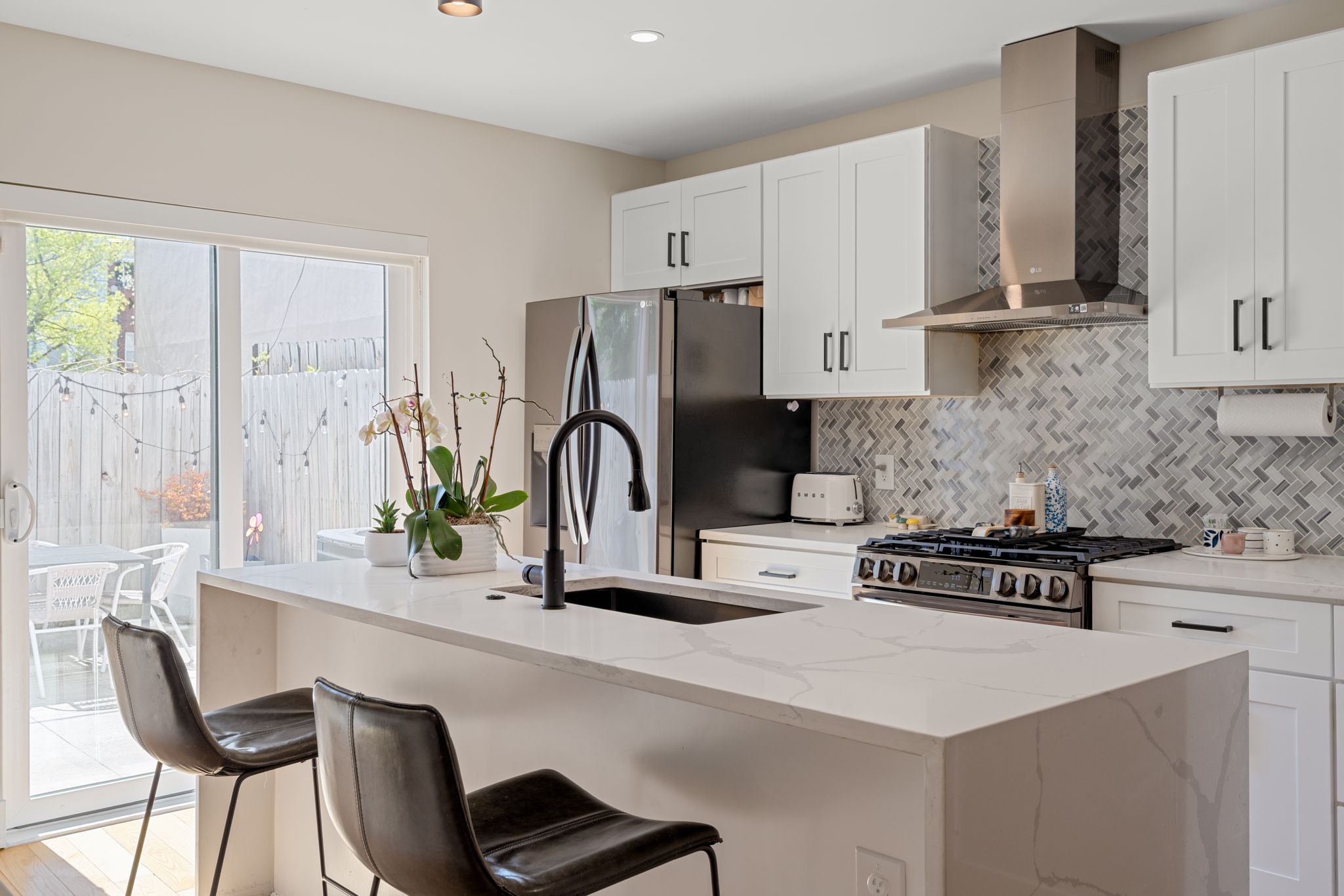 1934 Pemberton Street Philadelphia, PA 19146 - Photo 19 of 50 a kitchen with appliances a sink and cabinets