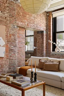 a living room with patio furniture