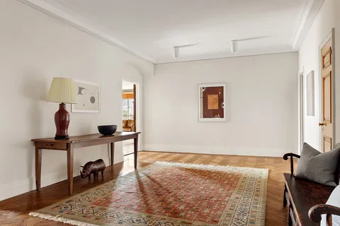 a workspace with furniture and window