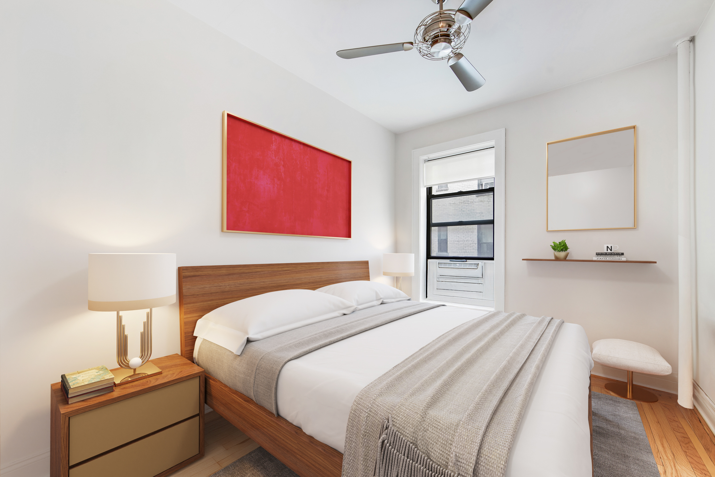 67 Morton Street, Unit 2B Manhattan, NY 10014 - Photo 7 of 12 a bedroom with a bed and a lamp on the dresser