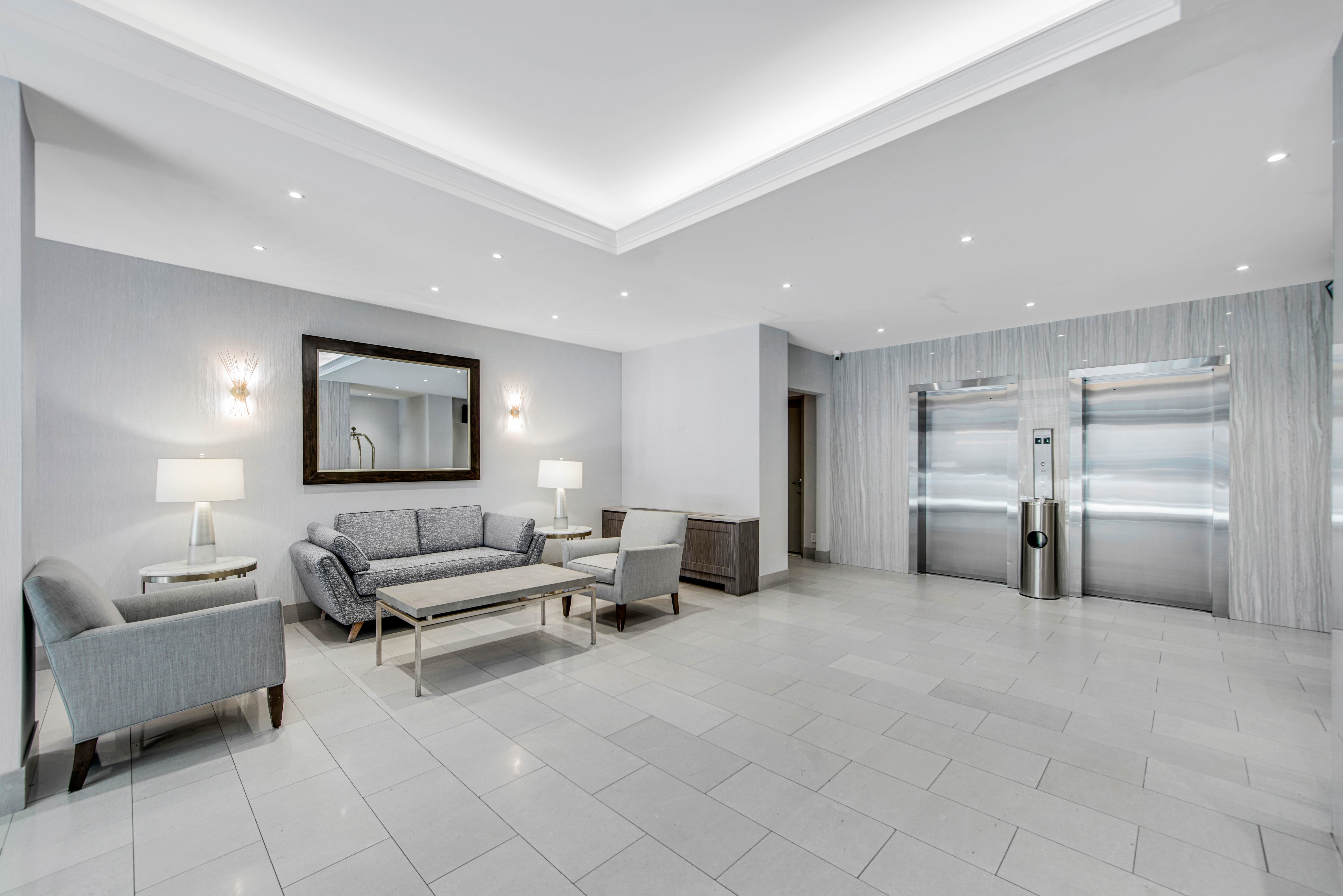 401 East 65th Street, Unit 10H Manhattan, NY 10065 - Photo 11 of 14 a living room with furniture and a couch