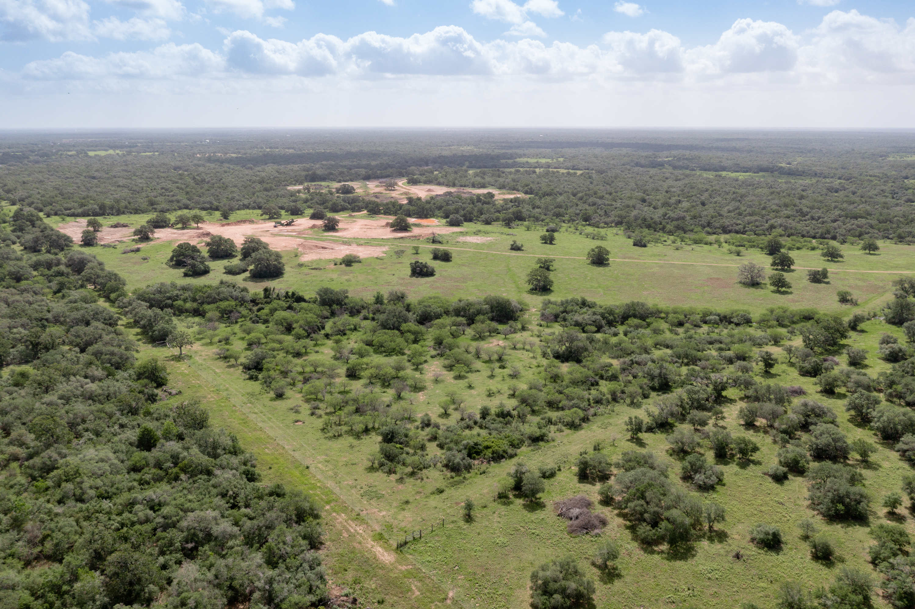 54.68 Cattle Guard Road Cuero, TX 77954 - Photo 25 of 67 a view of a lake with houses