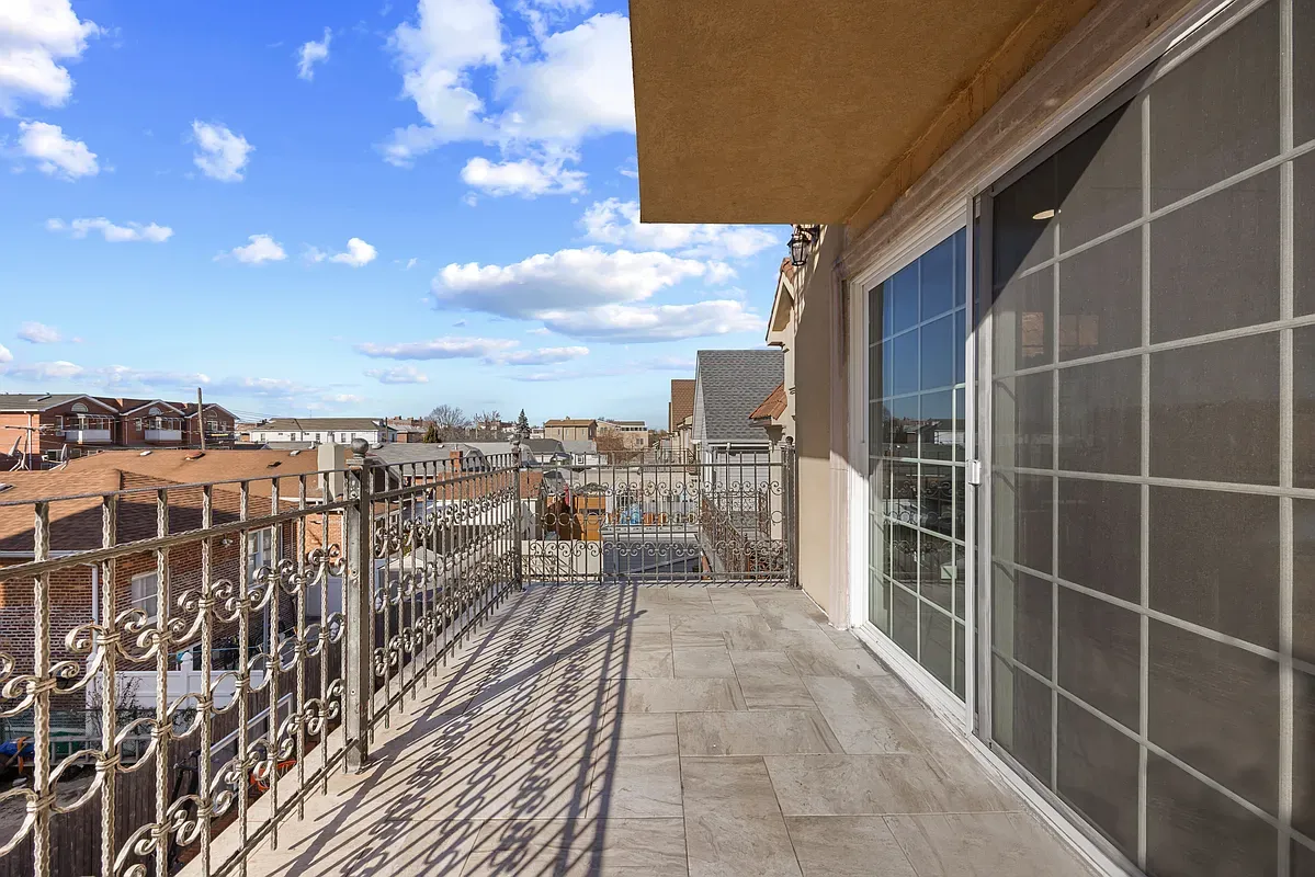 a view of a balcony with city view
