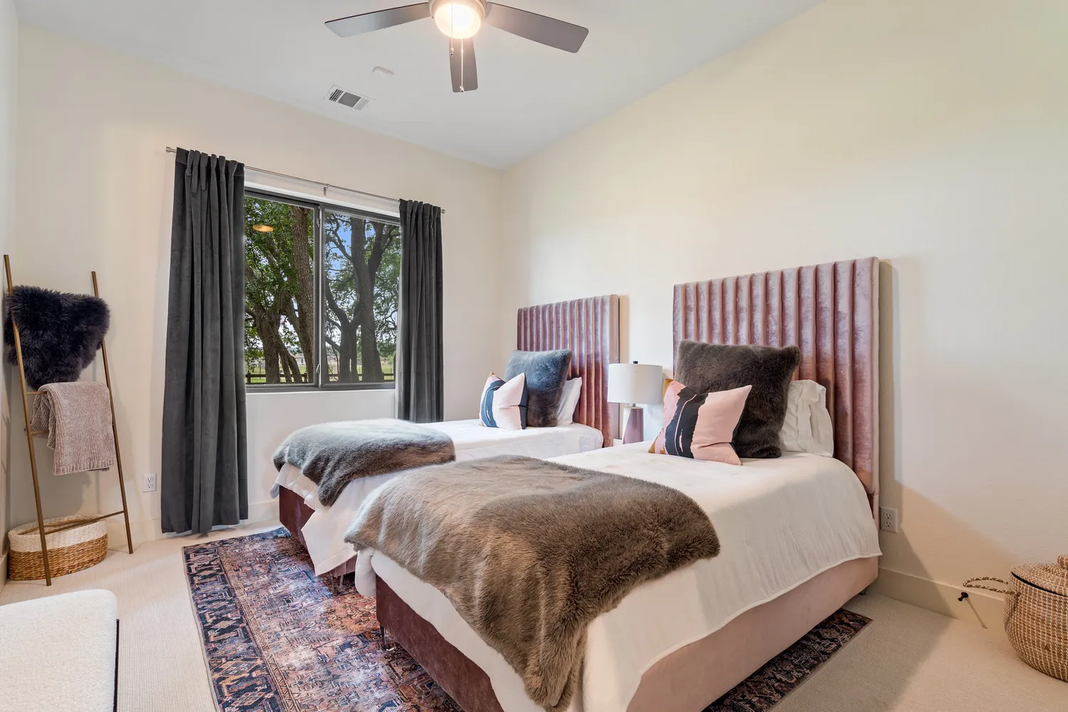 a view of a house with backyard and a tree