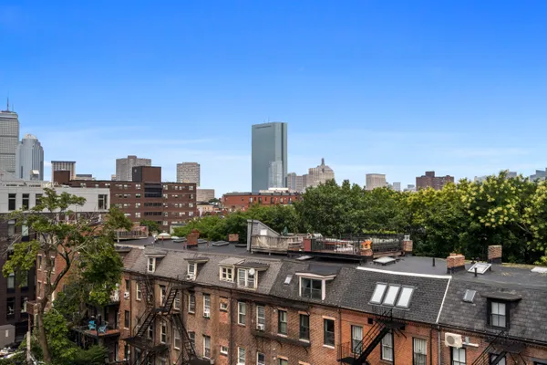 a view of city with tall buildings