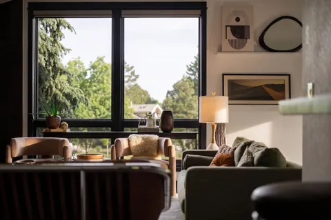 a view of balcony with furniture