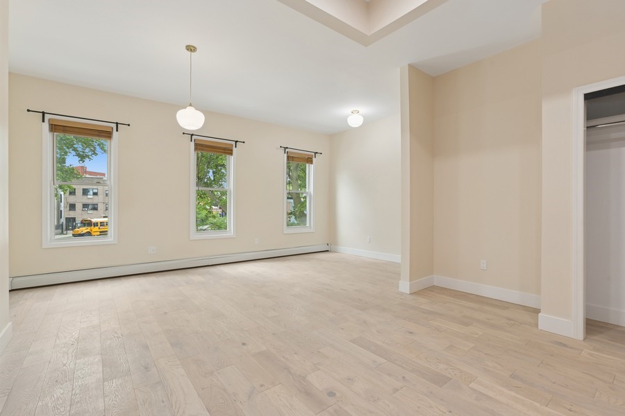 144 Somers Street, Unit 2 Brooklyn, NY 11233 - Photo 1 of 10 an empty room with windows and closet