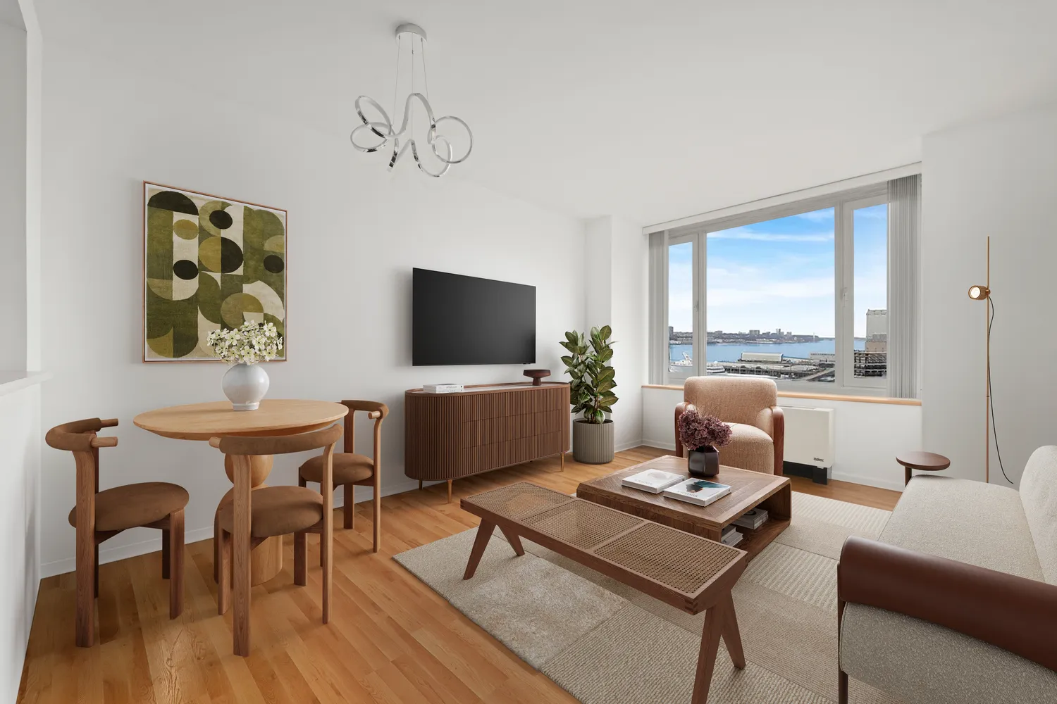 a living room with furniture a flat screen tv and a floor to ceiling window