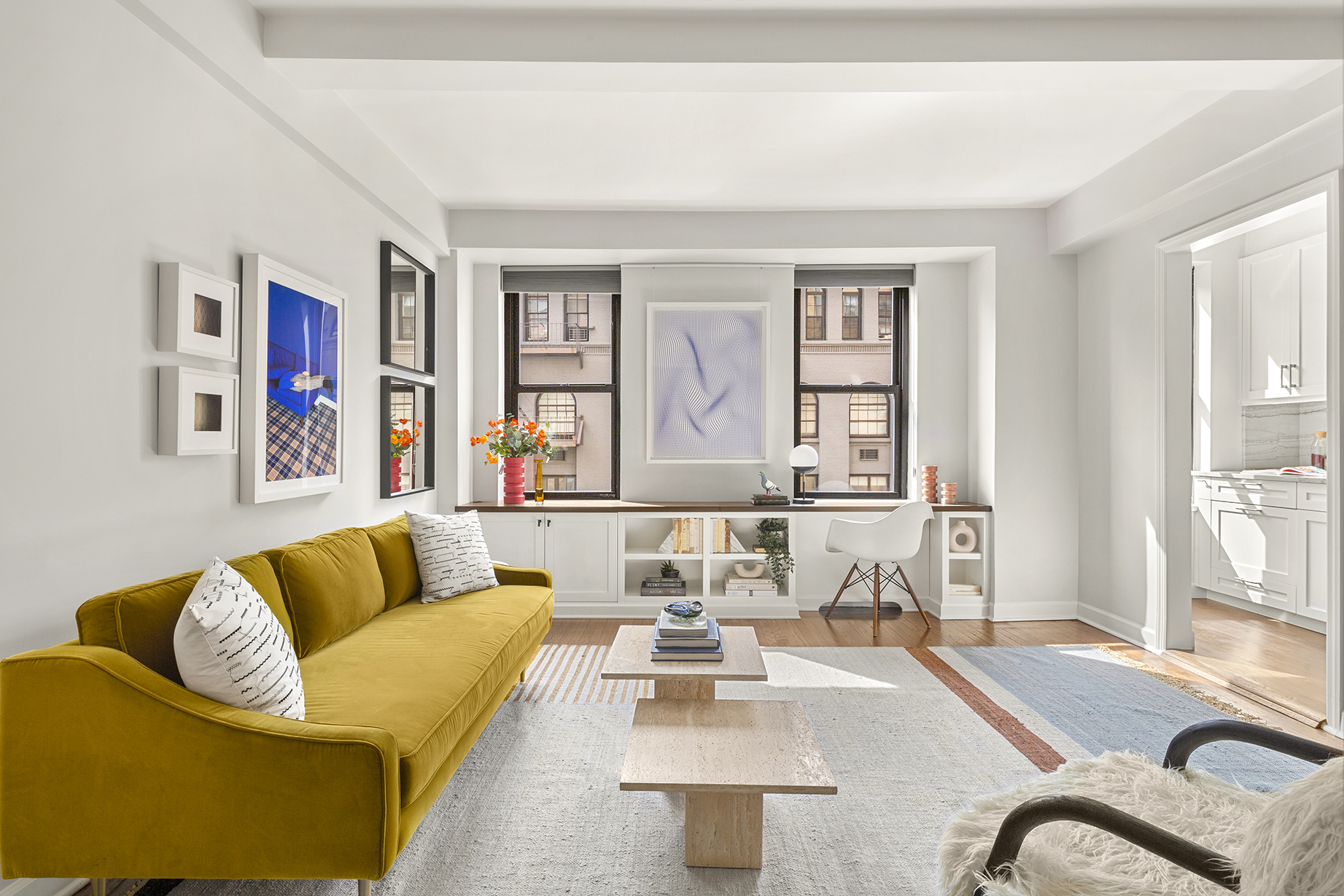 161 West 16th Street, Unit 6E Manhattan, NY 10011 - Photo 1 of 15 a living room with furniture and a couch