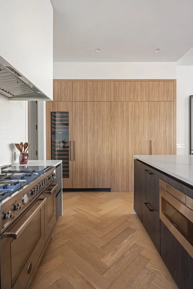a kitchen with stainless steel appliances a stove and a refrigerator