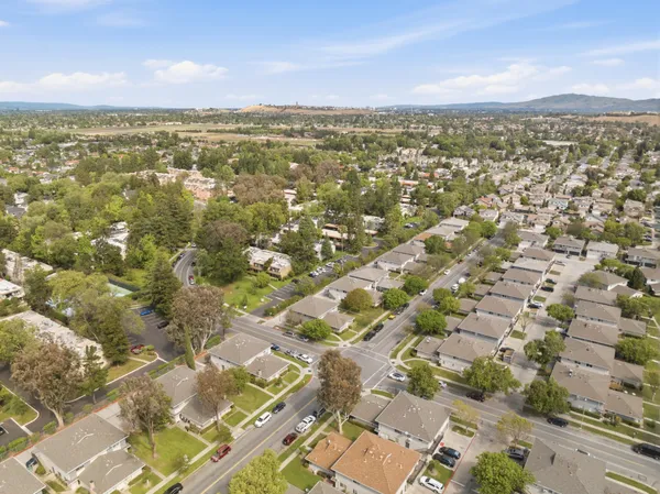 an aerial view of residential building with parking space
