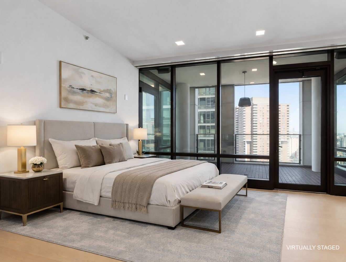 101 Warren Street, Unit 2420 Manhattan, NY 10007 - Photo 11 of 23 a bedroom with a large bed and a large window