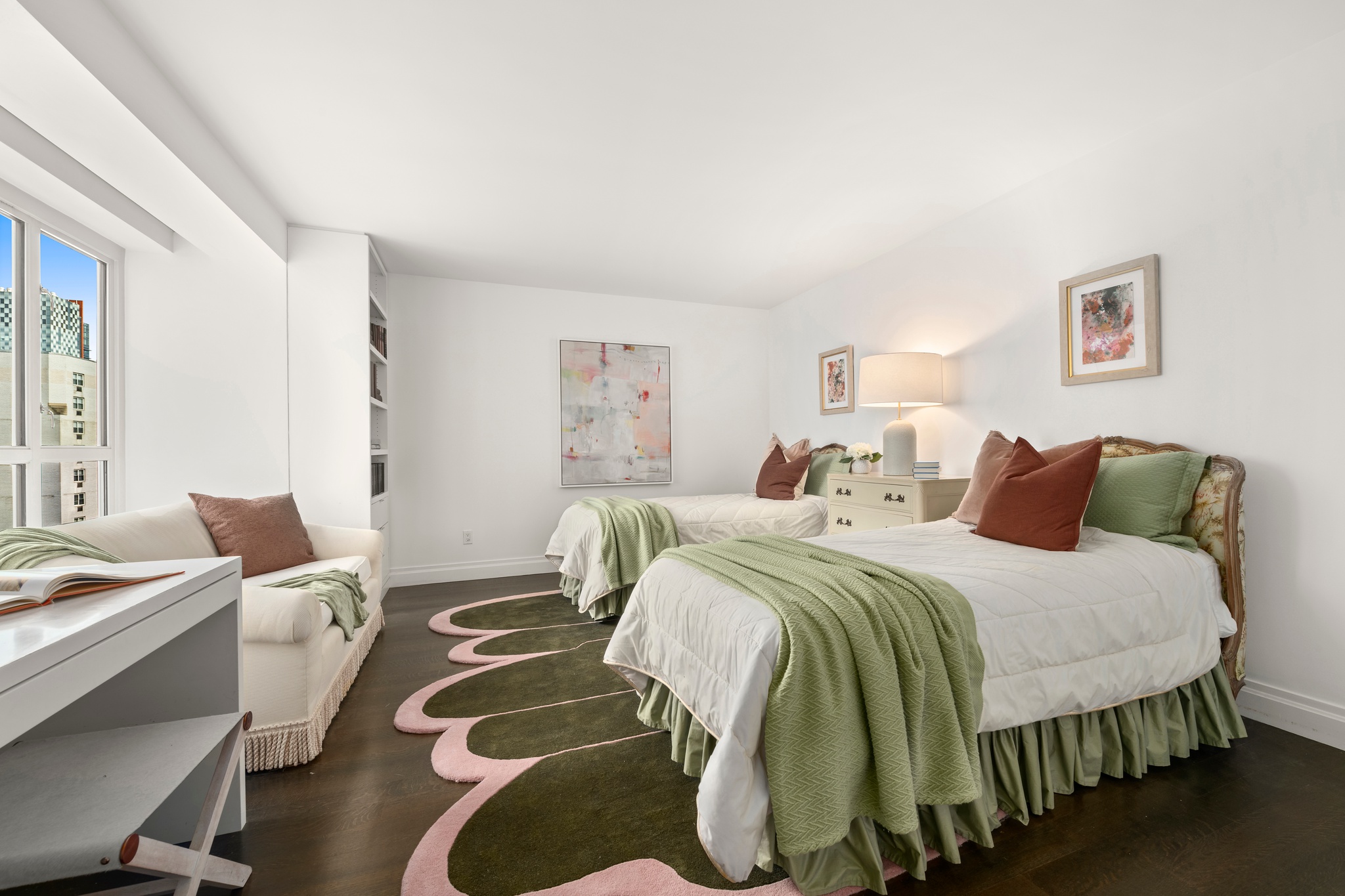 200 East 66th Street, Unit D1205 Manhattan, NY 10065 - Photo 11 of 33 a bedroom with a bed and wooden floor