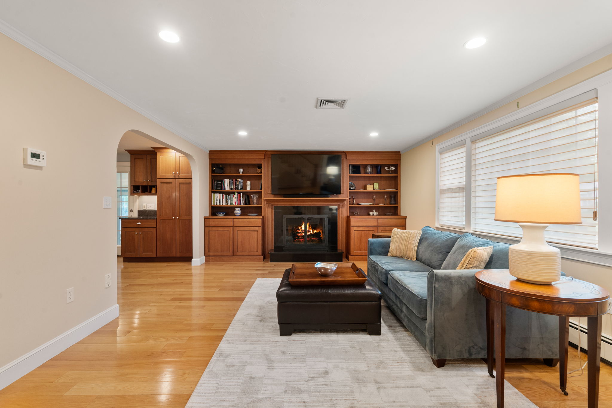 4 Gage Road Wayland, MA 01778 - Photo 6 of 32 a living room with furniture and a fireplace