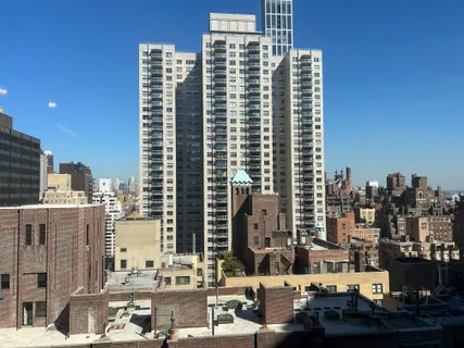 a view of a city with tall buildings