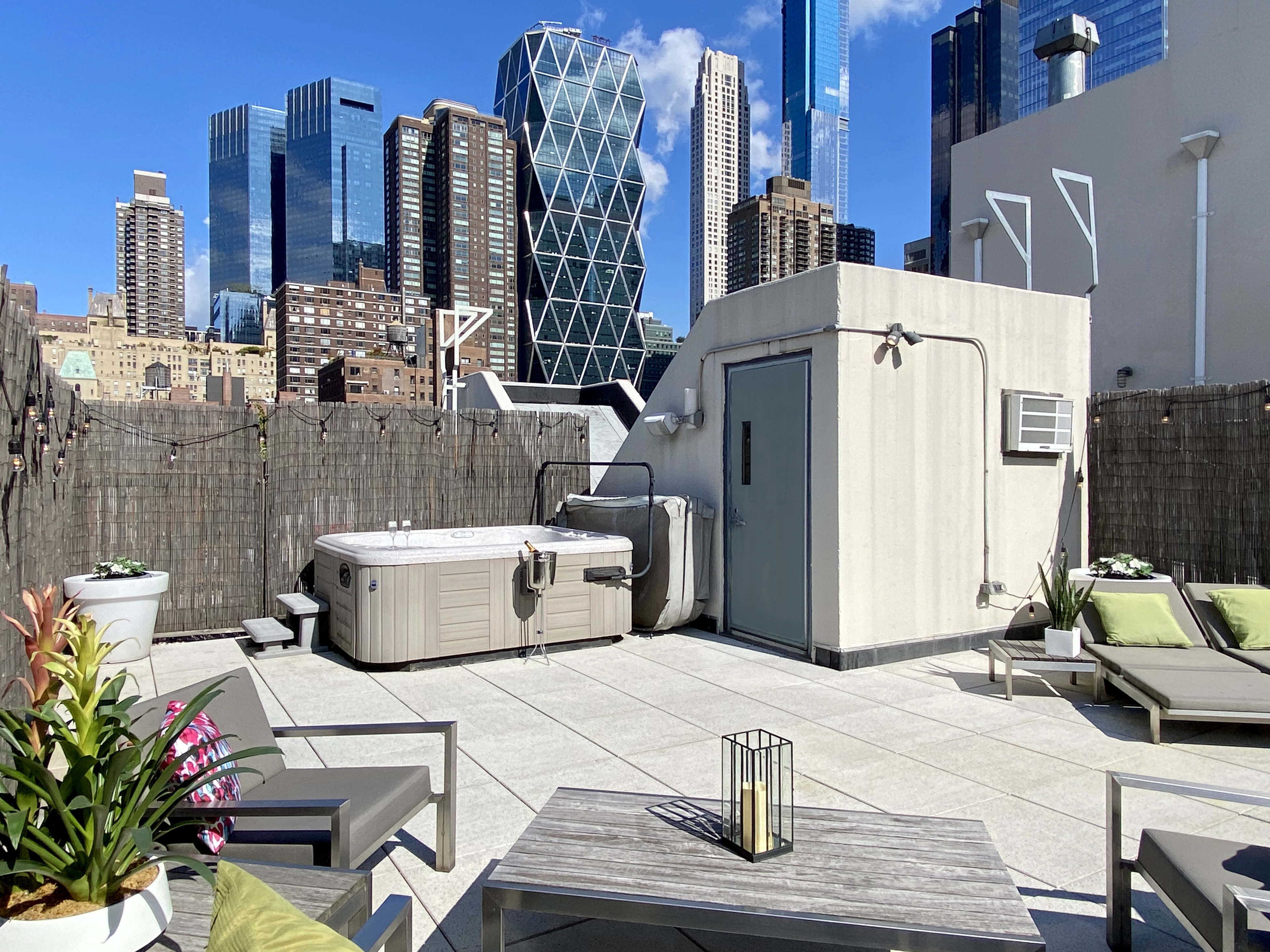 350 West 53rd Street, Unit PHA Manhattan, NY 10019 - Photo 25 of 35 a view of a building with sitting area