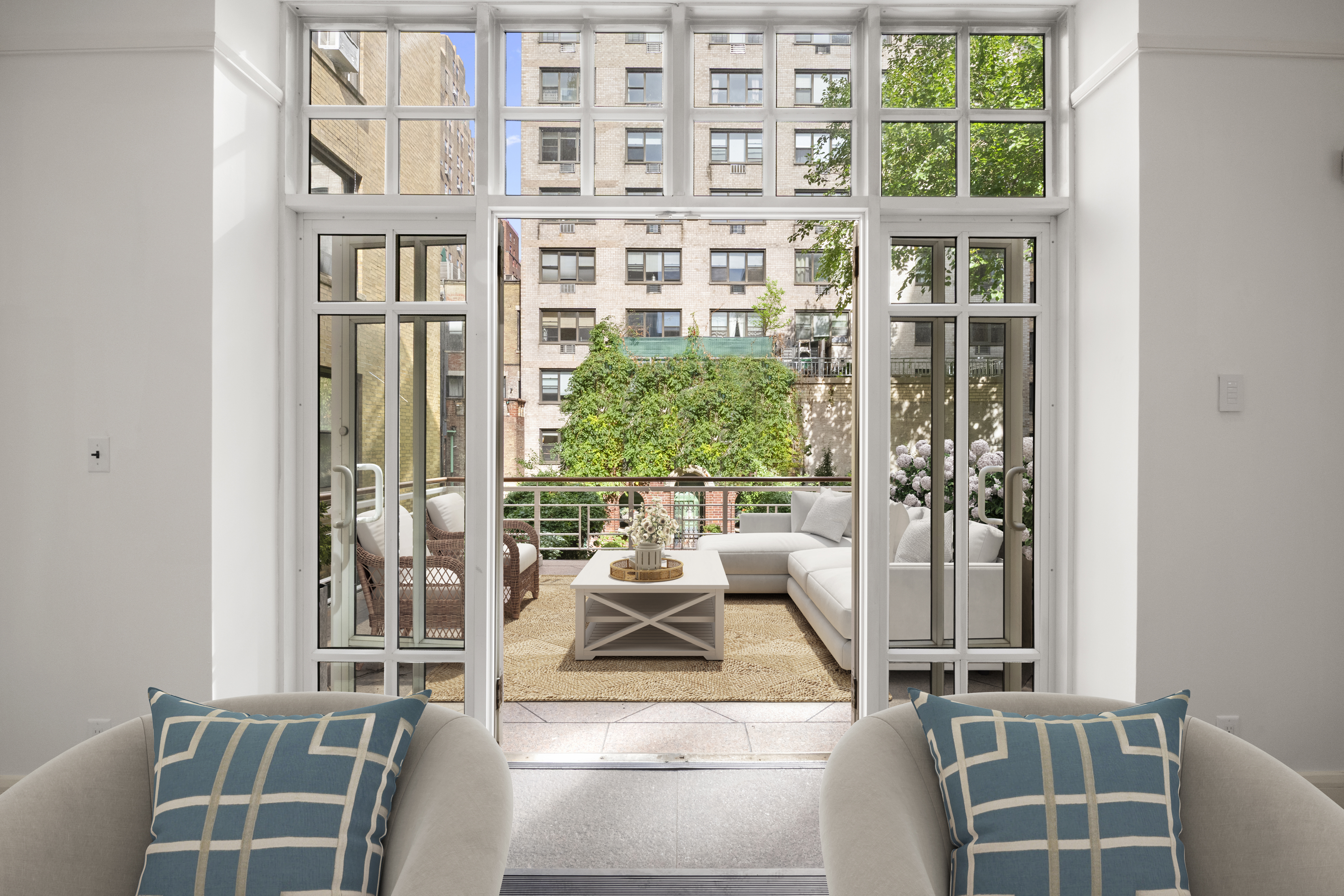 313 West 102nd Street Manhattan, NY 10025 - Photo 5 of 36 a living room with furniture