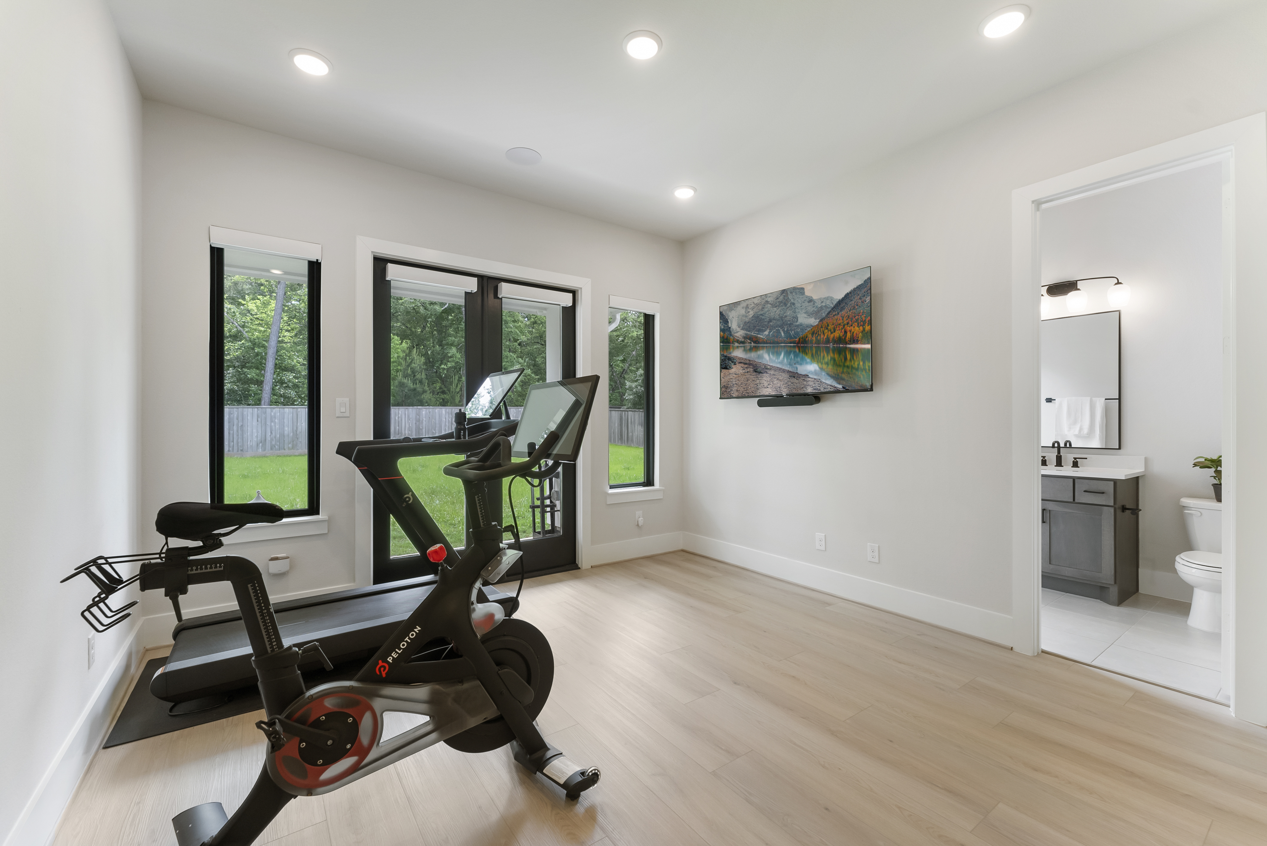 2118 Bennet Court Conroe, TX 77384 - Photo 38 of 70 a view of a room with gym equipment