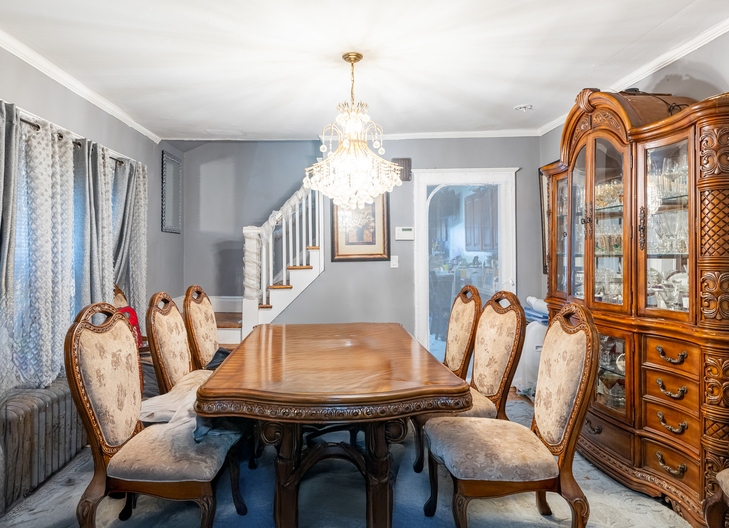 961 East 32nd Street Brooklyn, NY 11210 - Photo 5 of 24 a dining room with furniture and window