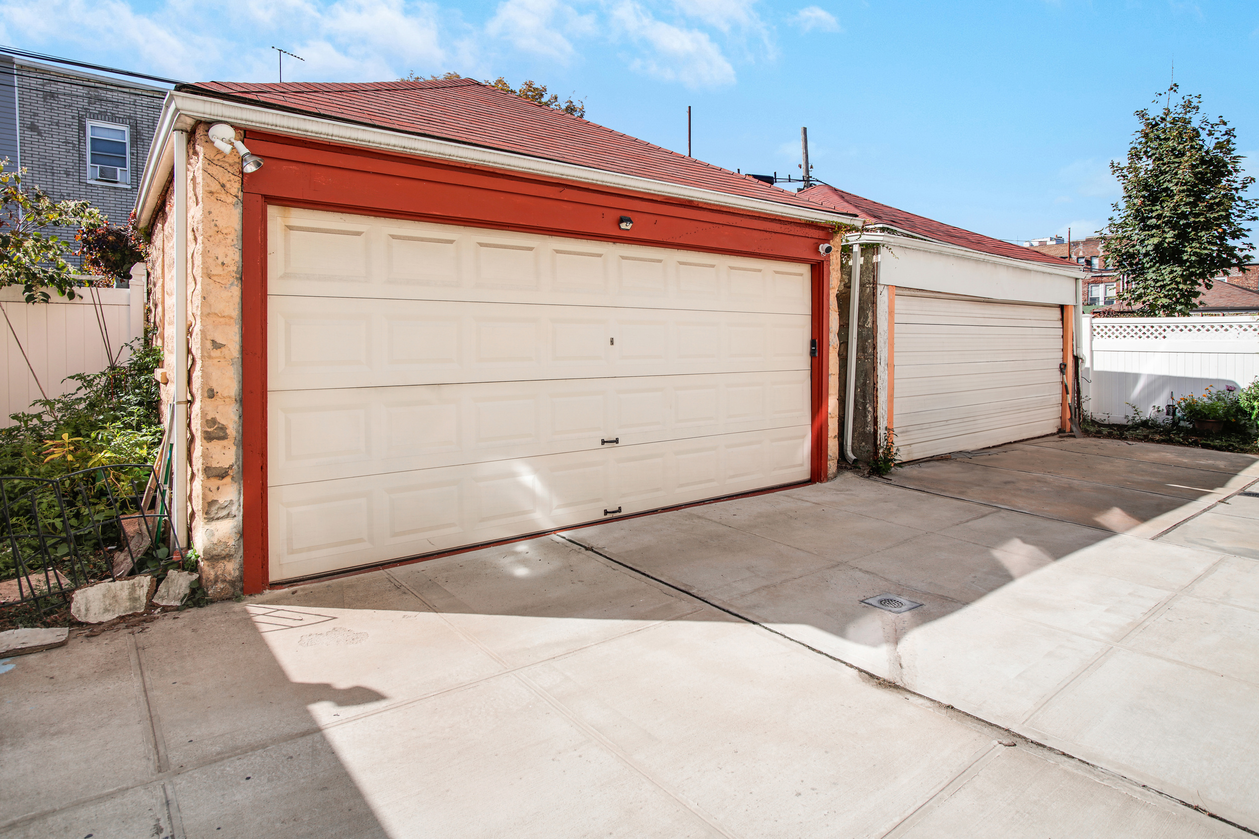 1532 Kimball Street Brooklyn, NY 11234 - Photo 12 of 13 a front view of a house with garage