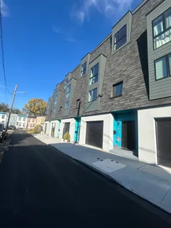 a front view of a house with a porch