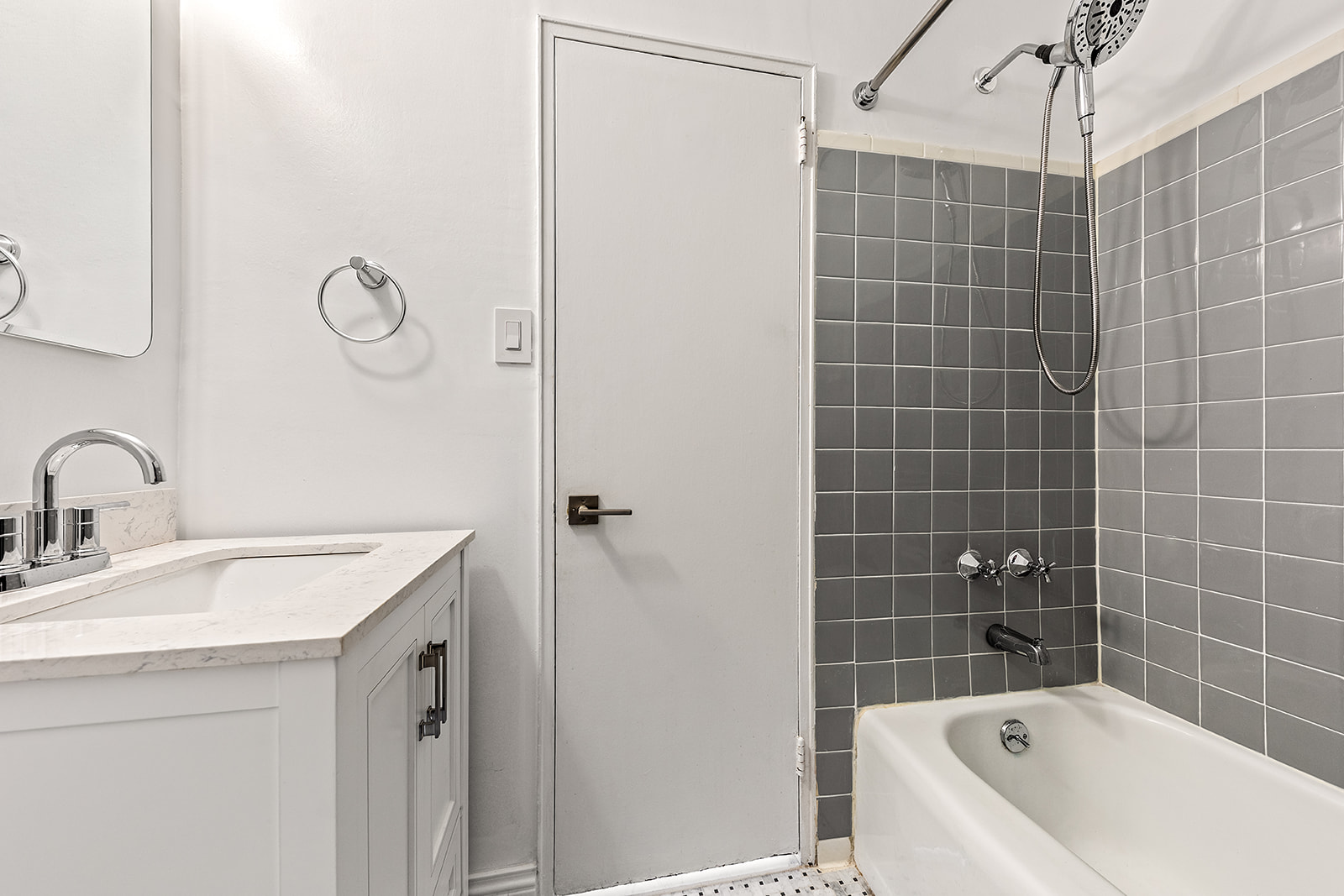110-50 71st Road, Unit PHD Queens, NY 11375 - Photo 9 of 14 a bathroom with a sink a toilet and shower