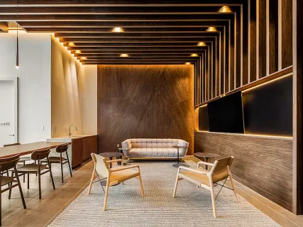 a balcony with table and chairs