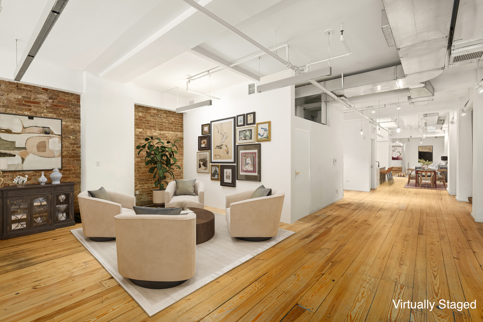 195 Bowery, Unit 2C Manhattan, NY 10002 - Photo 3 of 12 a living room with furniture and a wooden floor