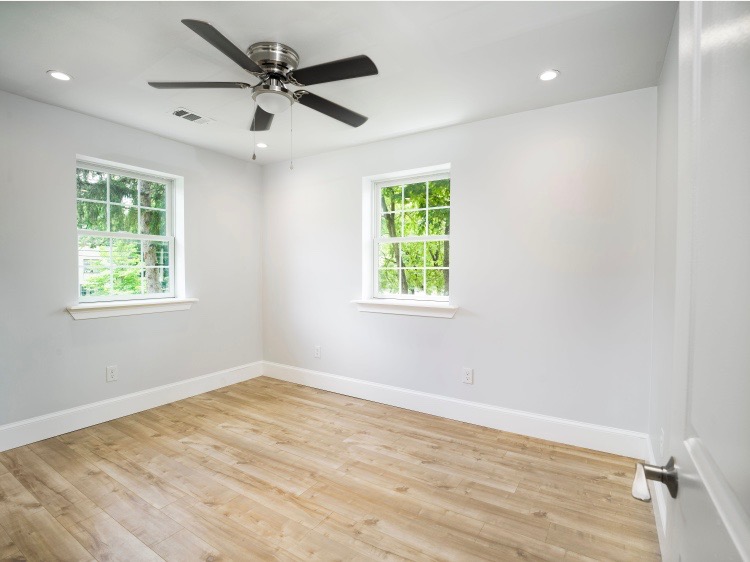 319 West Conestoga Road Devon, PA 19333 - Photo 29 of 38 an empty room with wooden floor and windows