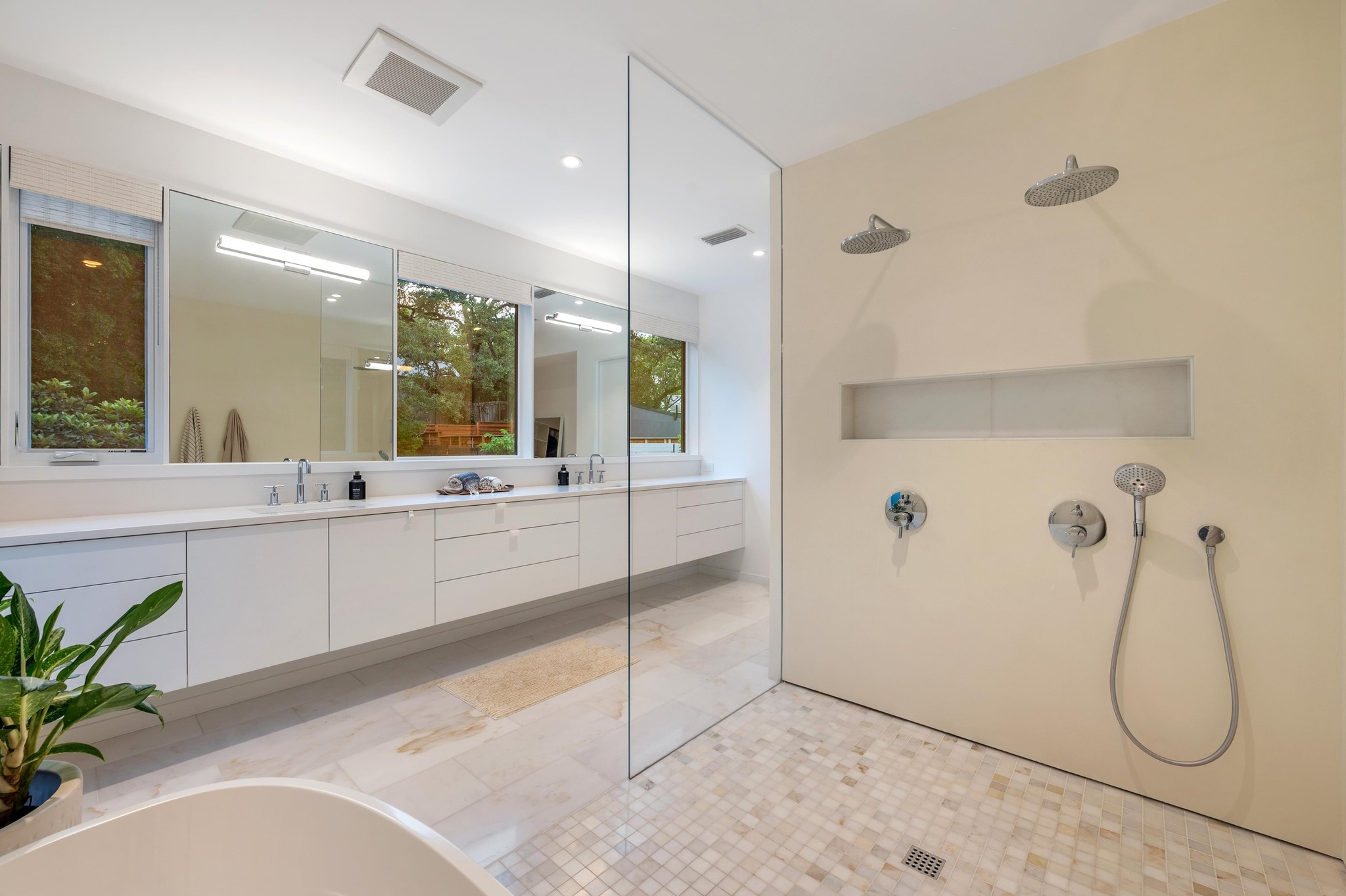 1206 Bickler Road Austin, TX 78704 - Photo 43 of 65 a bathroom with a sink and mirror