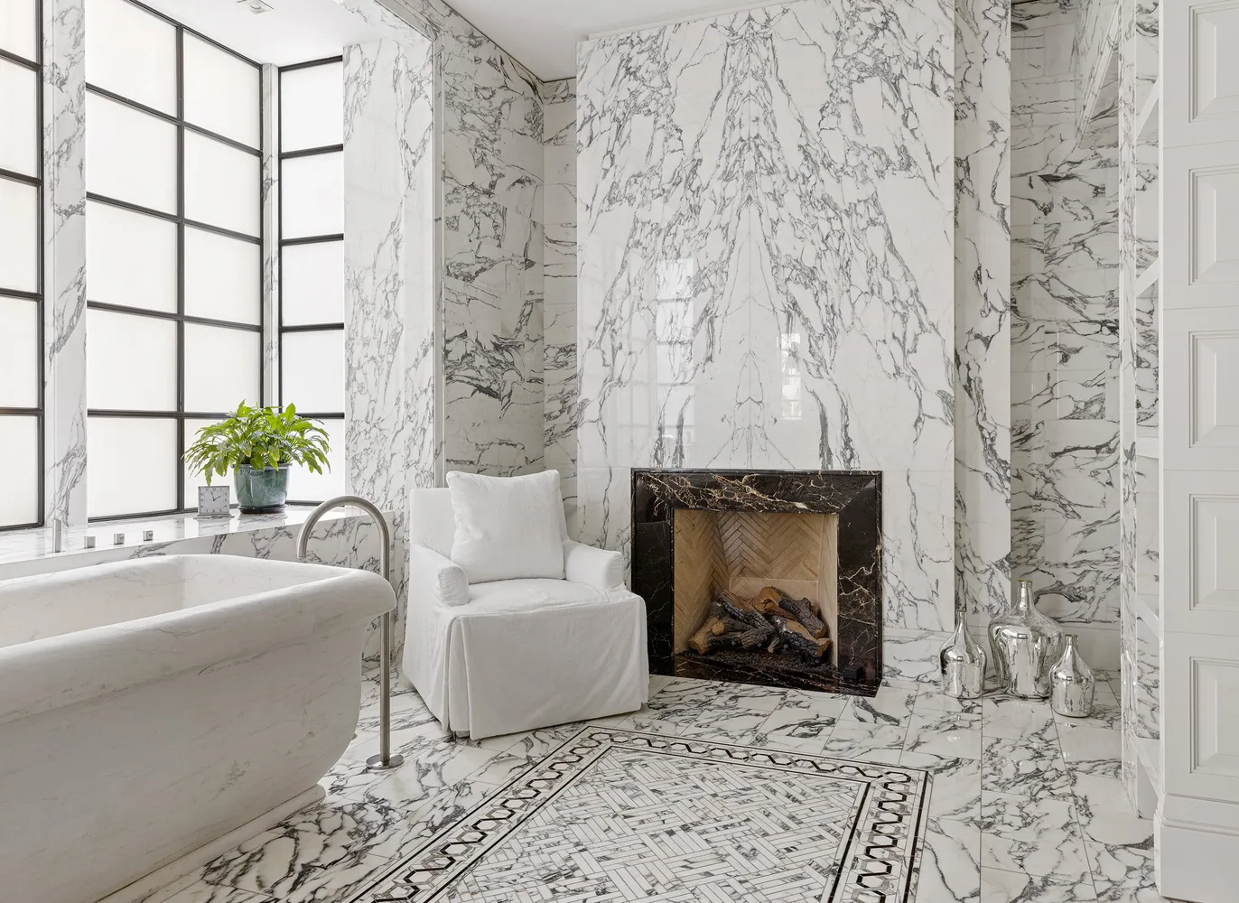 a view of a patio with table and chairs