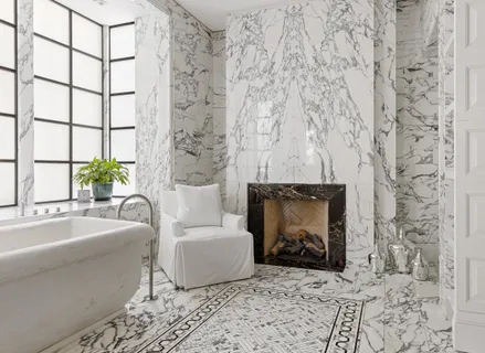 a view of a patio with table and chairs