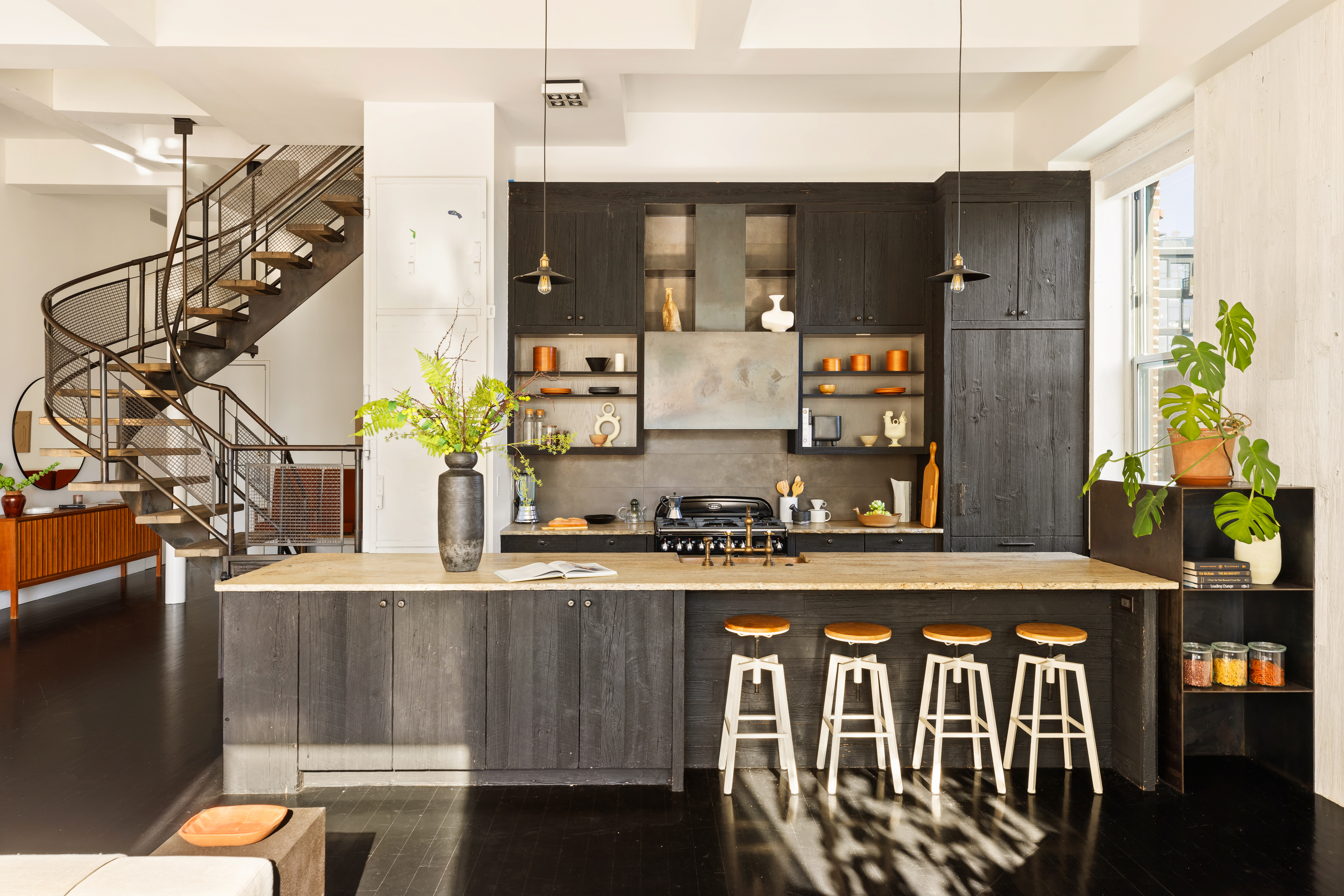 7 Bond Street, Unit PHAB Manhattan, NY 10012 - Photo 5 of 20 a kitchen with kitchen island a stove a sink and a refrigerator