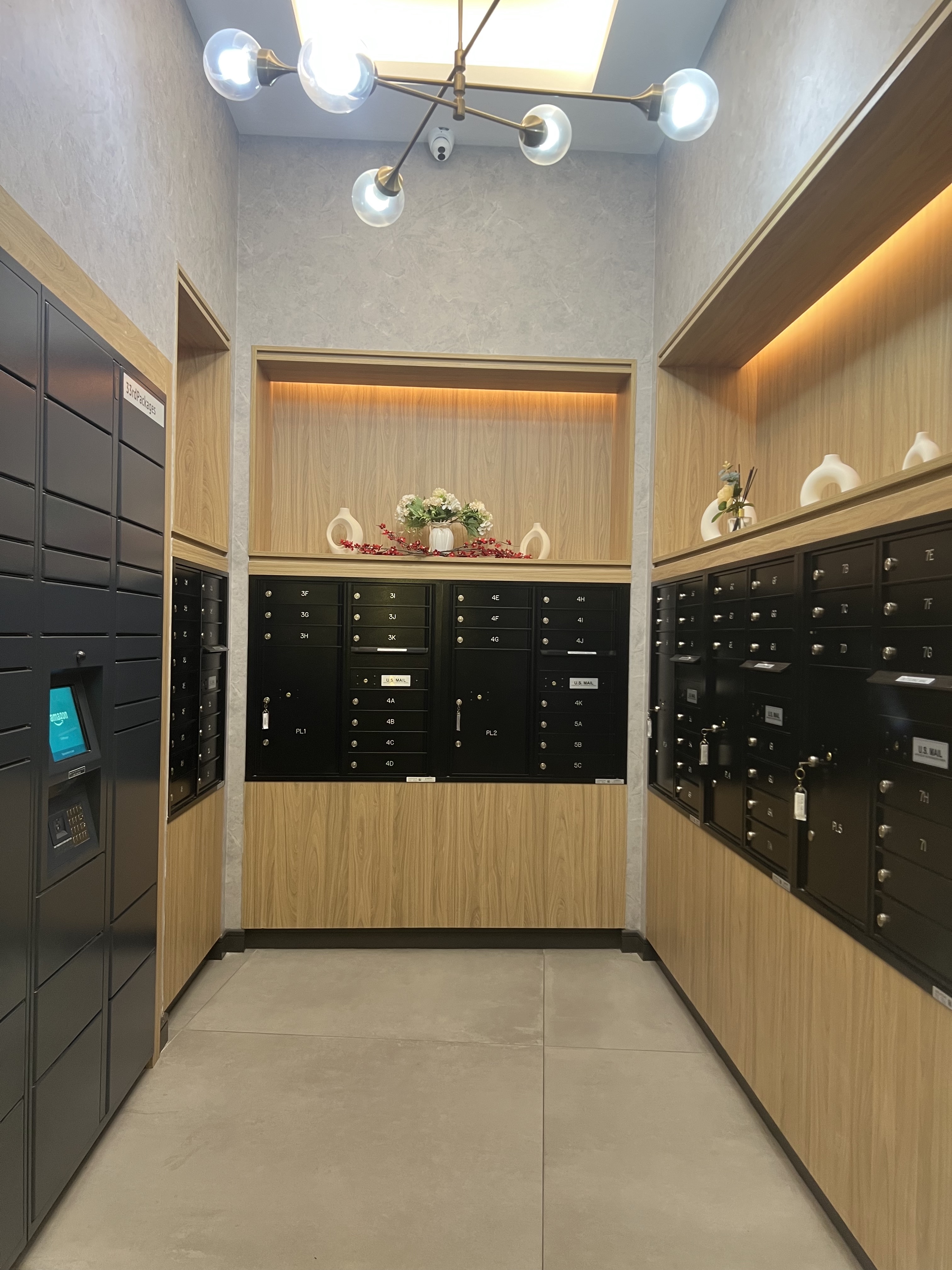 37-34 33rd Street, Unit 7H Queens, NY 11101 - Photo 15 of 18 a bathroom with a glass door shower and sink