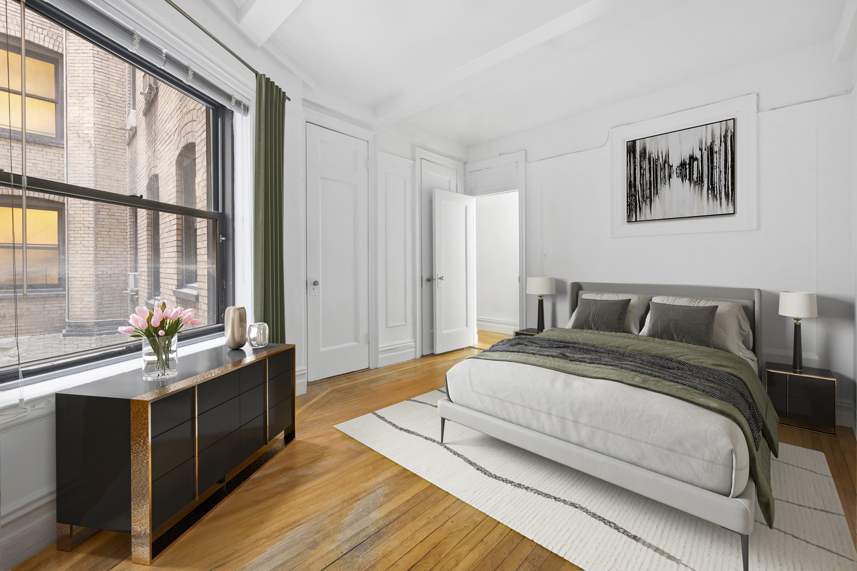 609 West 114th Street, Unit 2 Manhattan, NY 10025 - Photo 7 of 16 a spacious bedroom with a bed and a large window