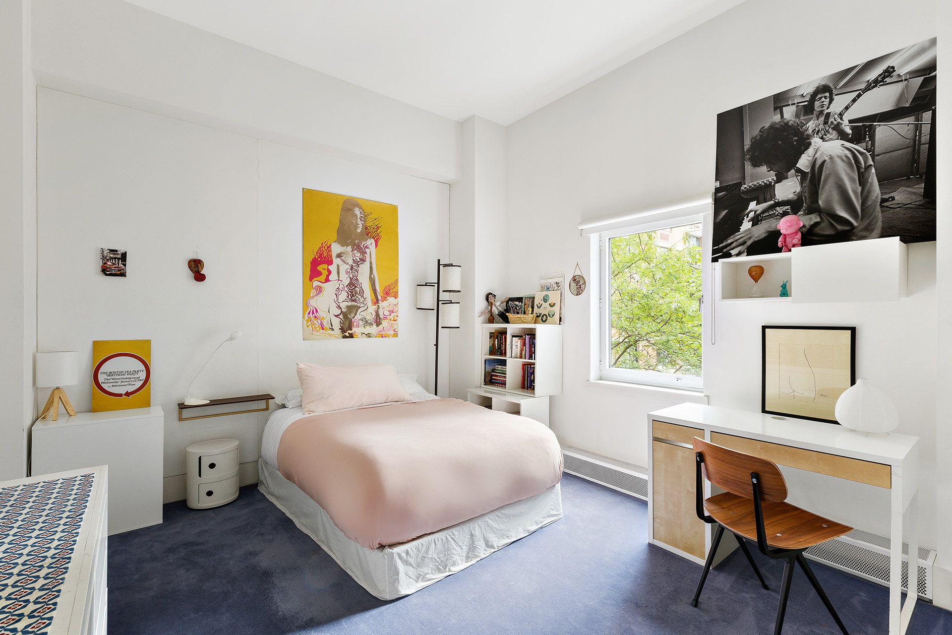 525 West 22nd Street, Unit 3AF Manhattan, NY 10011 - Photo 16 of 25 a bedroom with a bed and a window