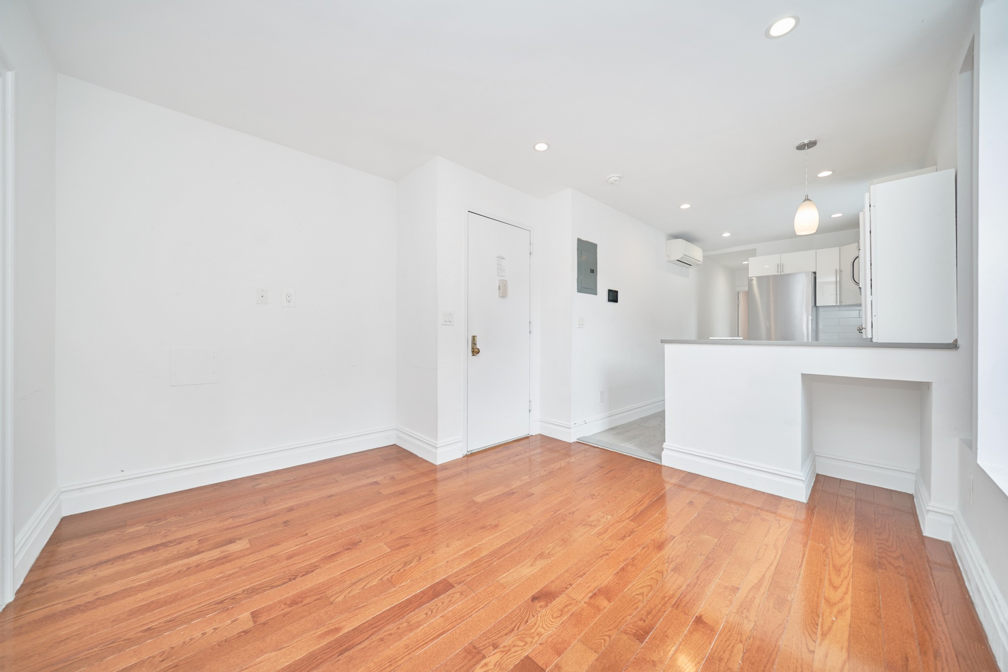 941 Columbus Avenue, Unit 1A Manhattan, NY 10025 - Photo 2 of 14 a view of a kitchen with wooden floor and a sink