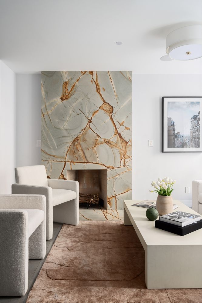 520 East 89th Street Manhattan, NY 10128 - Photo 11 of 40 a living room with furniture and a fireplace