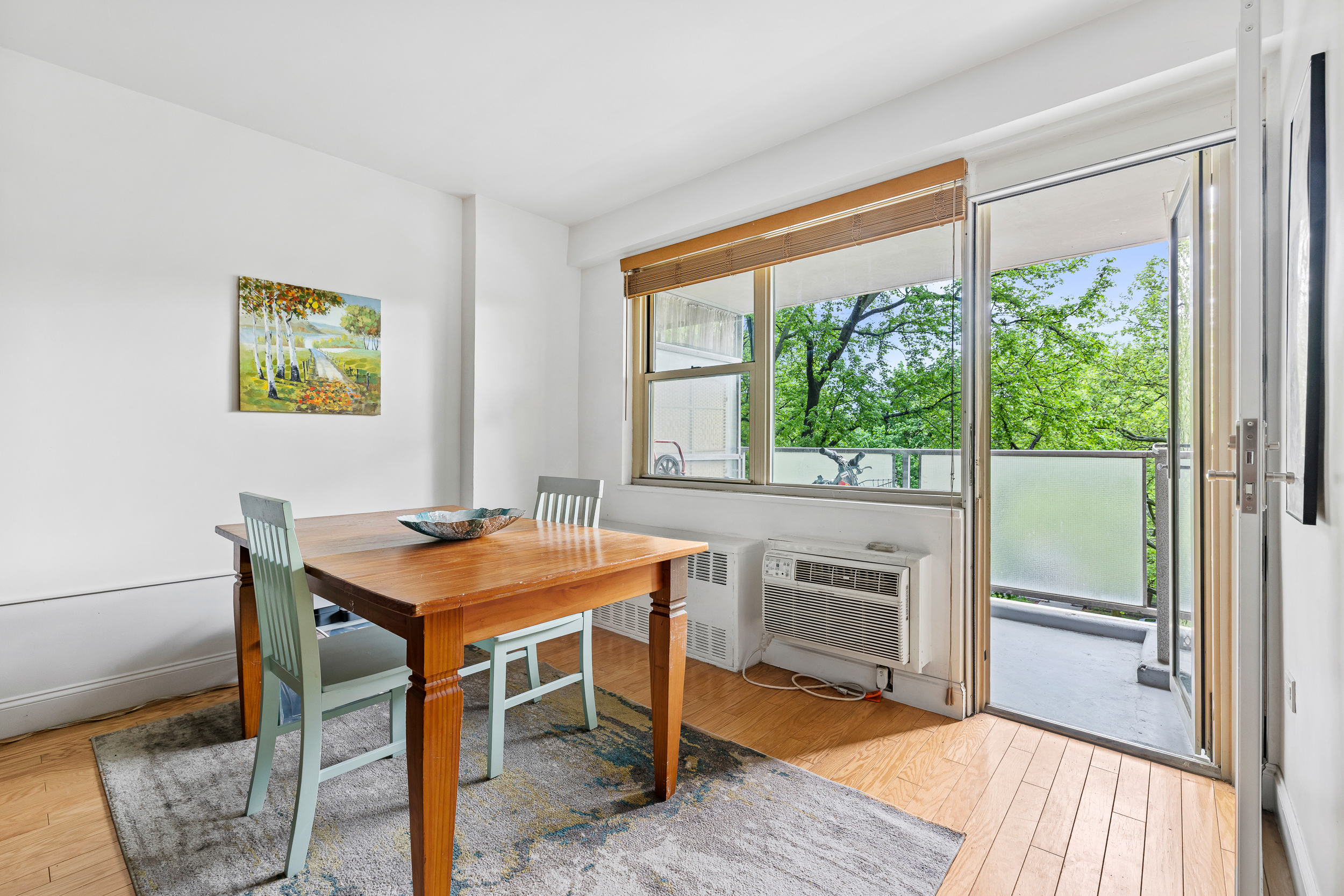 1065 Vermont Street, Unit 4L Brooklyn, NY 11207 - Photo 2 of 11 a view of a dining room with furniture window and outside view