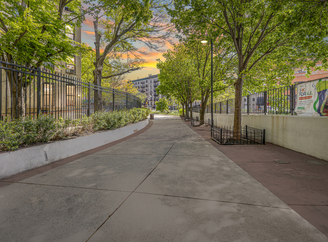 3333 Broadway, Unit D21C Manhattan, NY 10031 - Photo 13 of 22 a view of a house with a street