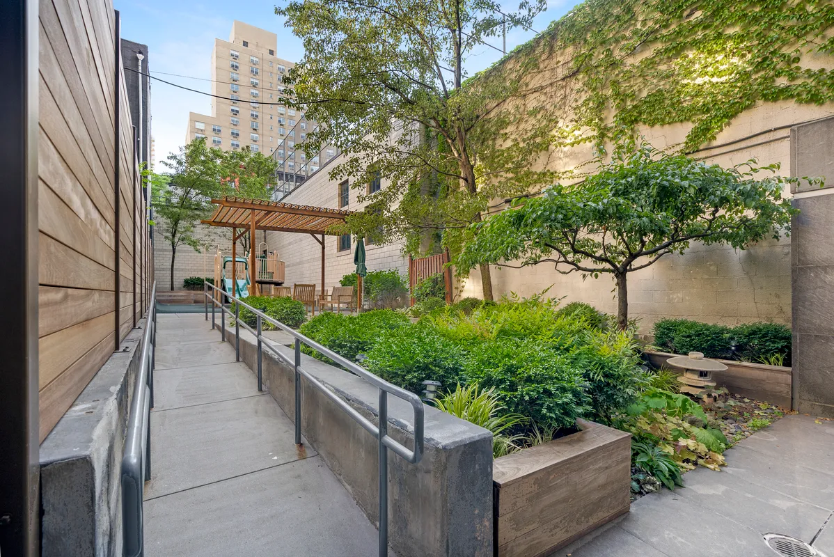 a view of a garden with pathway