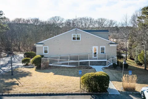 a view of street with large trees