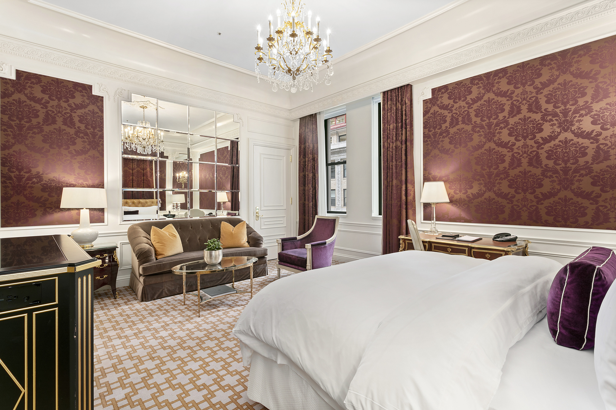 2 East 55th Street, Unit 829W38 Manhattan, NY 10022 - Photo 4 of 13 a bedroom with a bed and wooden floor