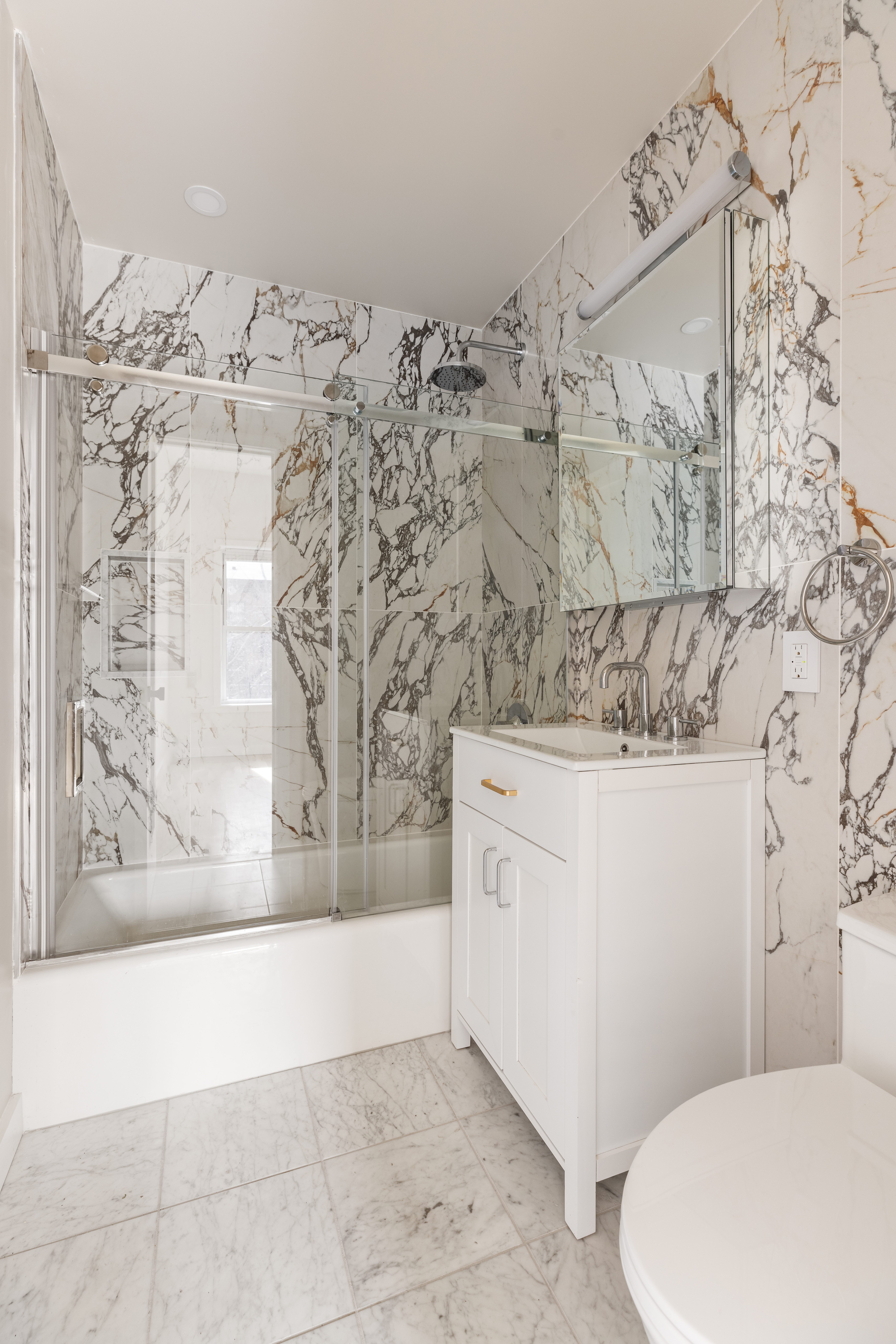 147 Atlantic Avenue, Unit 2 Brooklyn, NY 11201 - Photo 2 of 8 a bathroom with a bathtub and shower