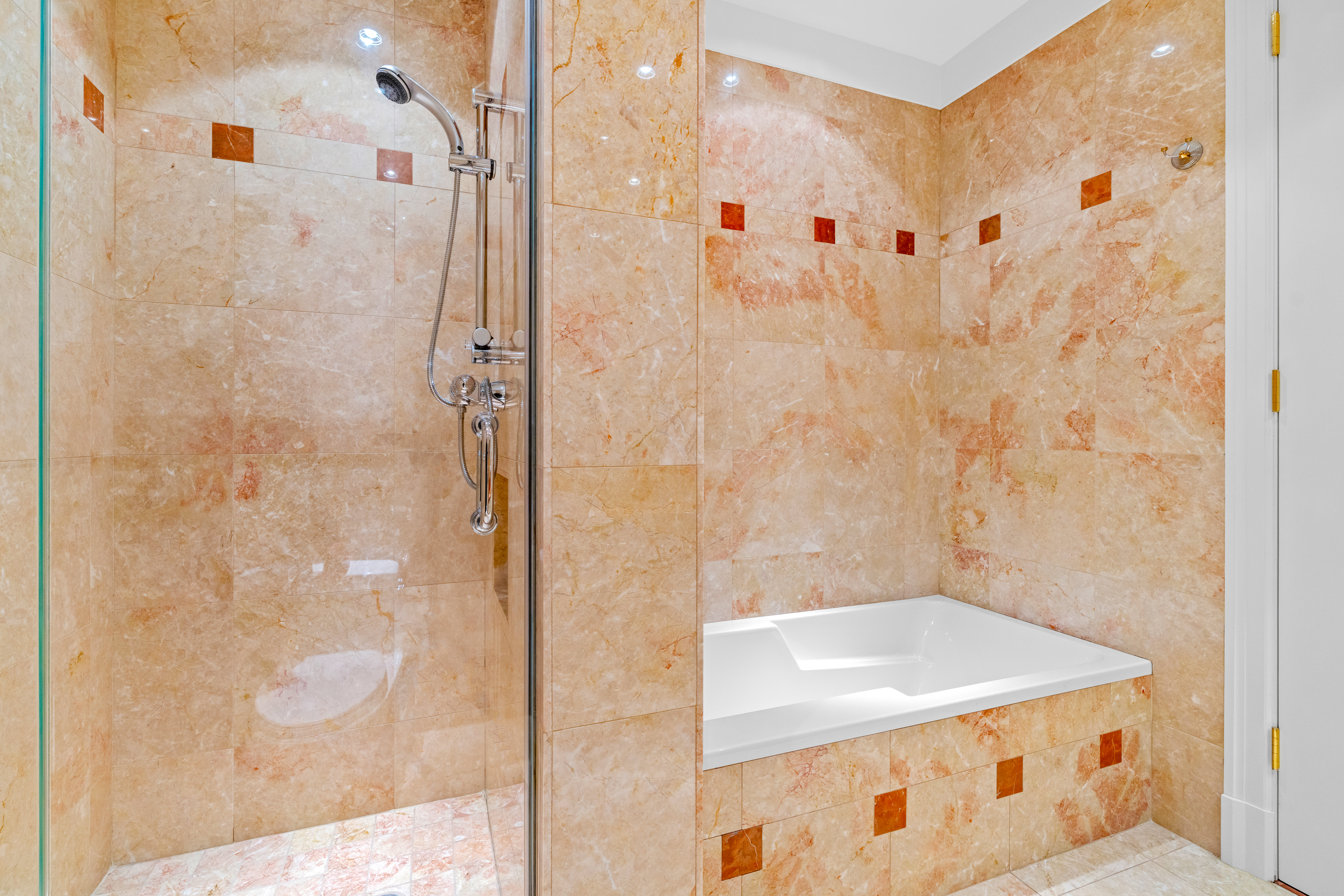 1965 Broadway, Unit 26EF Manhattan, NY 10023 - Photo 28 of 32 a bathroom with a shower and a sink