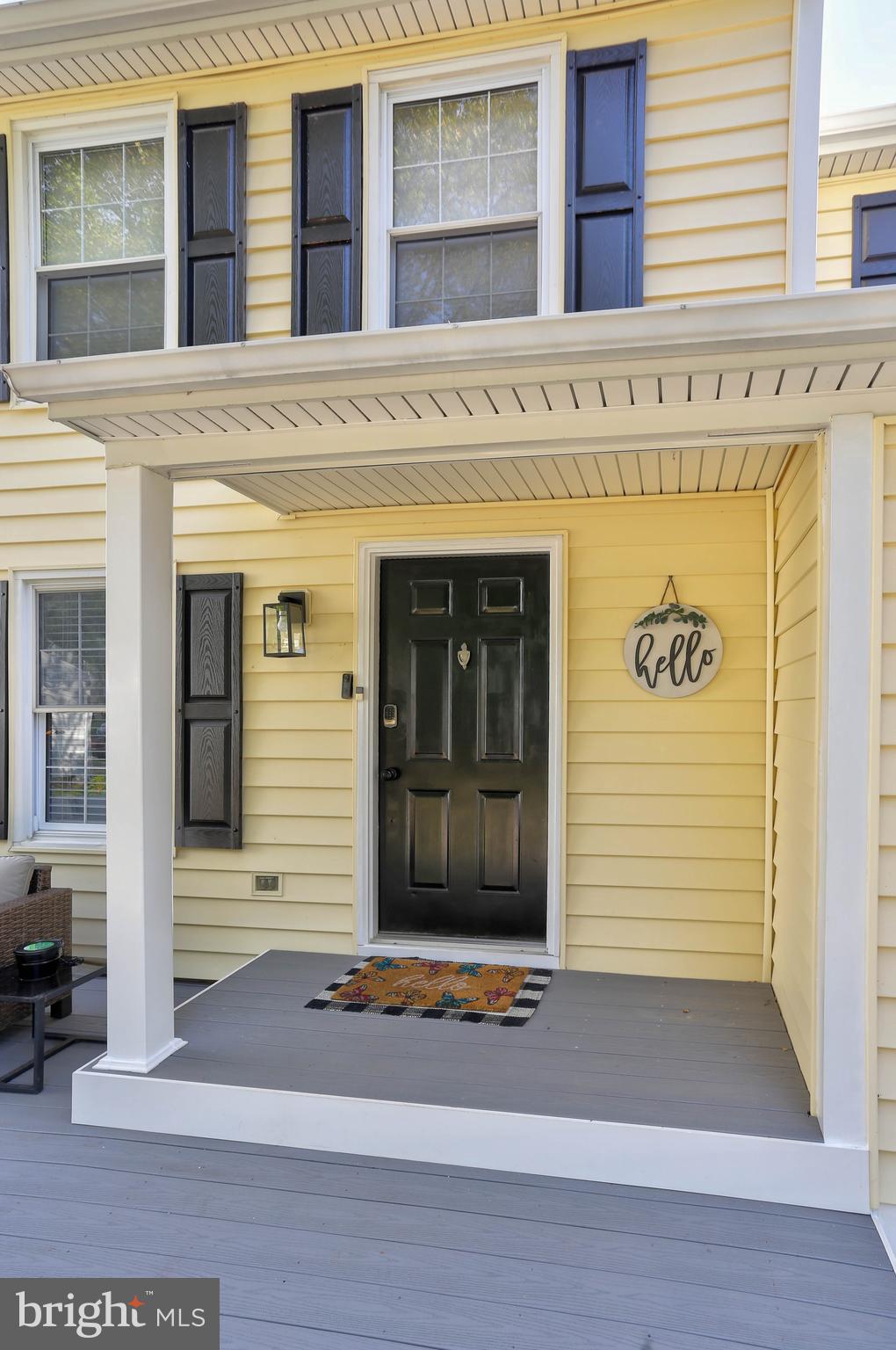 6257 Fairbourne Court Hanover, MD 21076 - Photo 4 of 47 a front view of a building with entryway