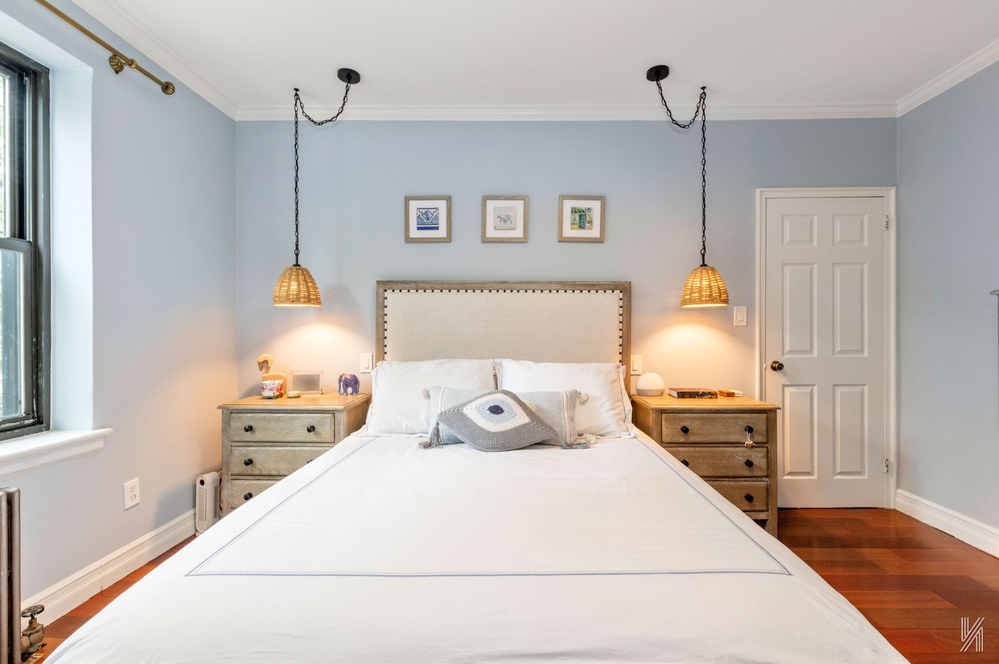 22-31 77th Street, Unit C2 Queens, NY 11370 - Photo 9 of 17 a bedroom with a bed and wooden floor