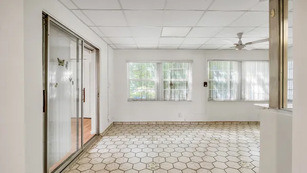 an empty room with windows